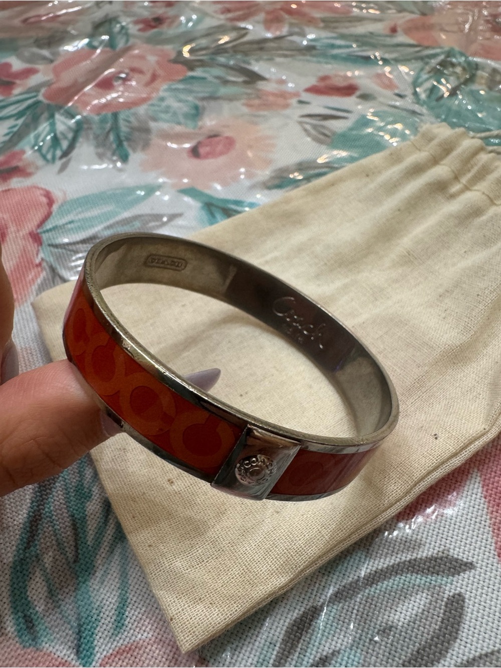 Coach Enamel Signature C Bangle in Red-Orange with Silver Accent